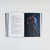 Open book spread showing formatted text page opposite a full-page illustration of figures kissing in dark, atmospheric lighting