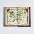 Open book spread presenting a full-color detailed fantasy map of The Continent